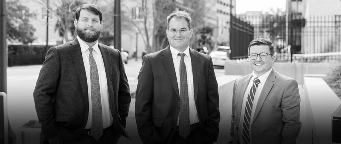 Attorneys Richard Holston, Gregory Vaughan and Cody Poe